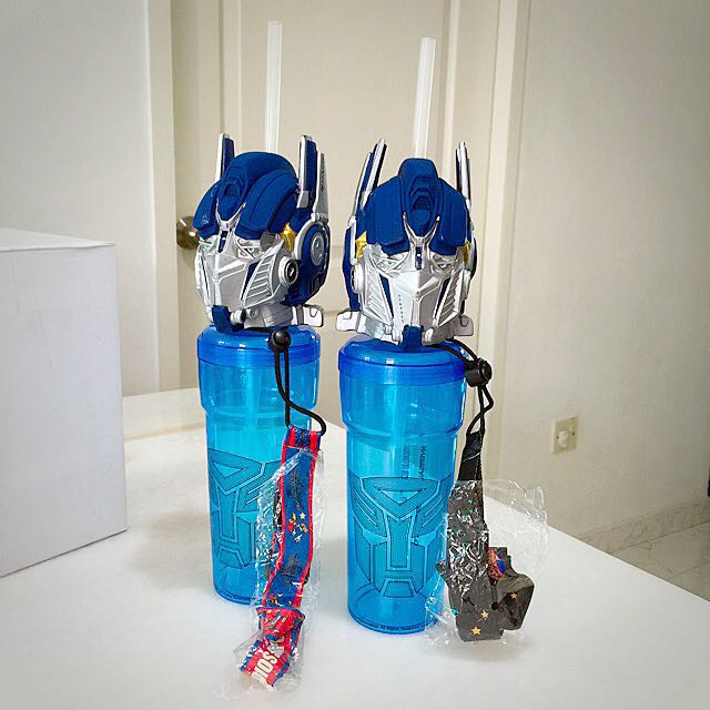 https://media.karousell.com/media/photos/products/2016/07/05/uss_3d_transformer_optimus_prime_water_bottle_with_strap_1467724532_e7d433d7.jpg