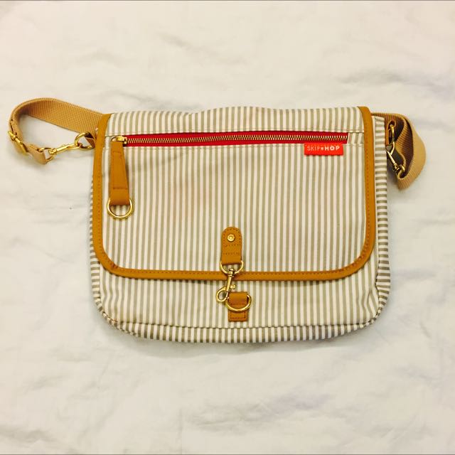 Pending Skip hop Soho Crossbody Diaper Clutch Babies Kids Going Out Diaper Bags Wetbags on Carousell
