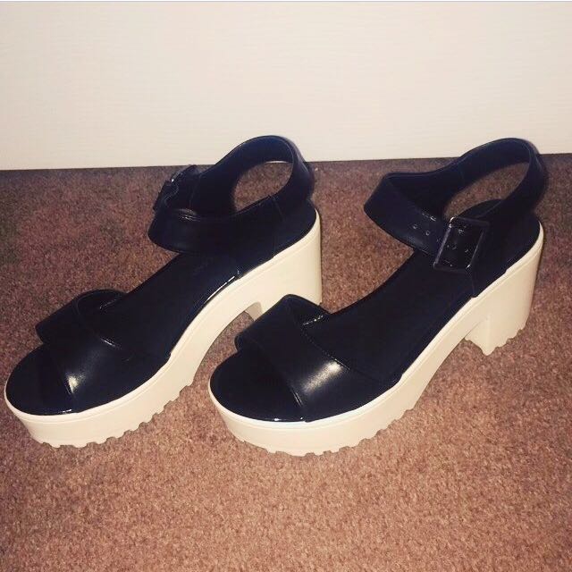 white cleated platform sandals