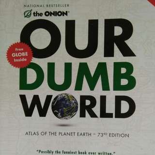 The Onion: Our Dumb World (Full Colour Large Paperback)