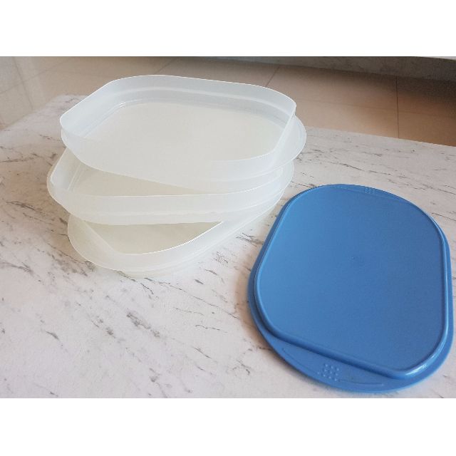 Authentic TupperWare, Container (Category: Water Purifers & Dispensers) located in Singapore. Submitted by jtmr93 (Listing ID 63796547, Image 2). Description: Brand New Authentic TupperWare, Container Box Dimension (estimate measurement) *Each stack - Length: 21.5cm - Width: 15.5cm - Height: 3.5cm Suitable for using as storage (Example: candy, spices, beans, fish, nuts etc.).