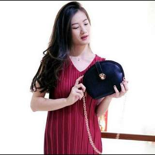 ROUND SLINGBAG