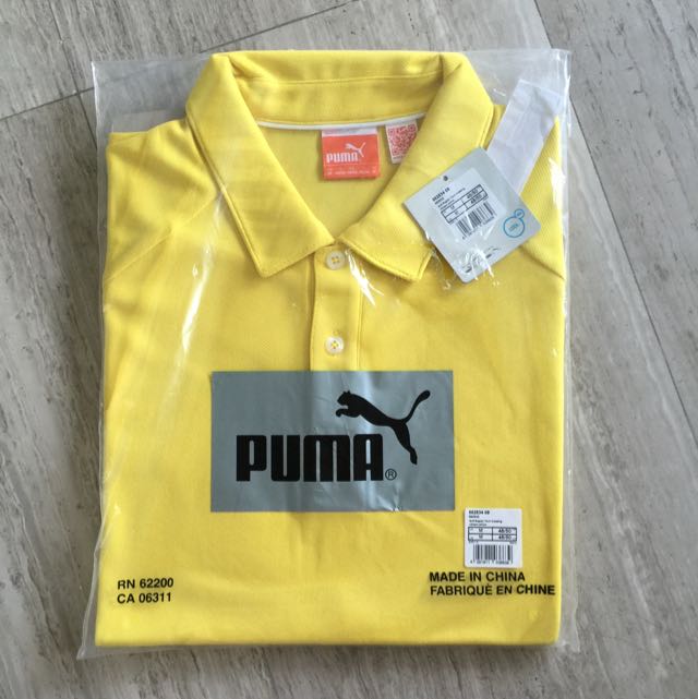 yellow puma golf shirt