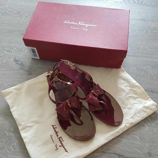 wine colored flip flops