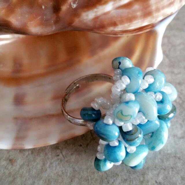 Handmade Ring (Category: Accessories) located in Singapore. Submitted by fishjee (Listing ID 64849673, Image 1). Description: One n only pc handmade coral shell ring. Size adjustable .