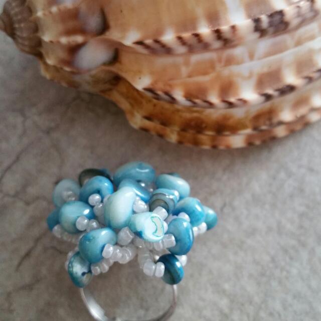 Handmade Ring (Category: Accessories) located in Singapore. Submitted by fishjee (Listing ID 64849673, Image 2). Description: One n only pc handmade coral shell ring. Size adjustable .