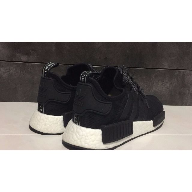 nmd triple black reflective