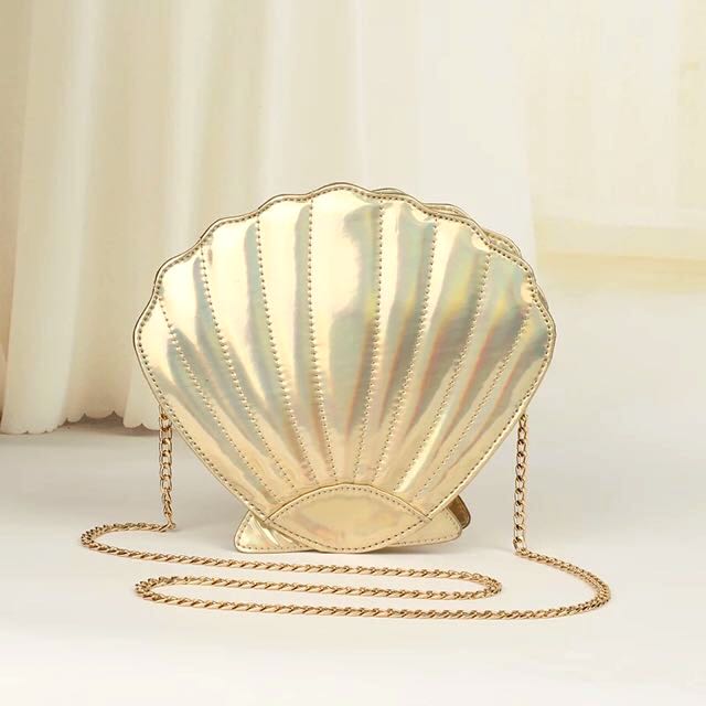 Gold new arrivals shell clutch