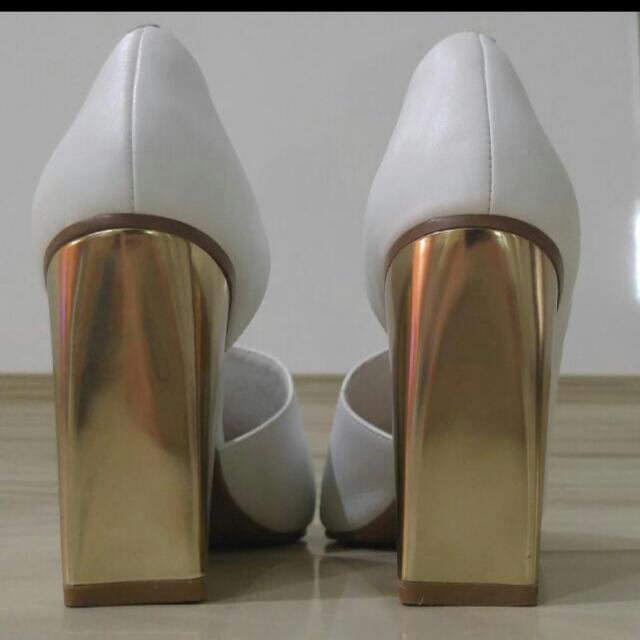 white shoes with gold heel