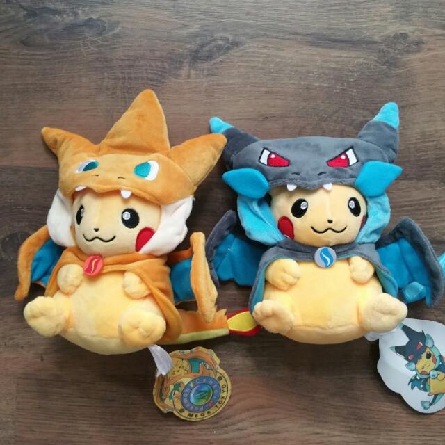 Pikachu with shop charizard hat