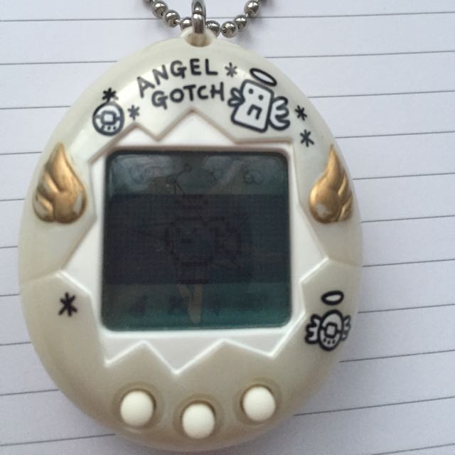 Angelgotchi (Tamagotchi), Hobbies & Toys, Toys & Games on Carousell