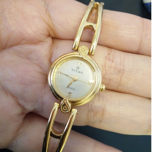 Titan Womens 2247YAB Raga Gold Tone Watch Intl