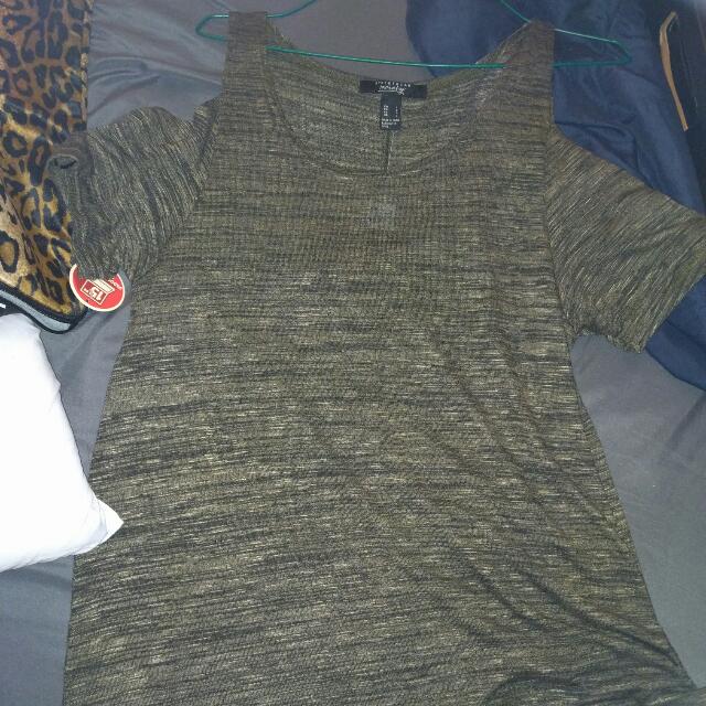 Cold Shoulder Dress From Urban Planet. New With Tags. Size L. Olive Green. (Category: Clothes) located in Toronto. Submitted by gabs_j (Listing ID 69847098, Image 1). Description: .