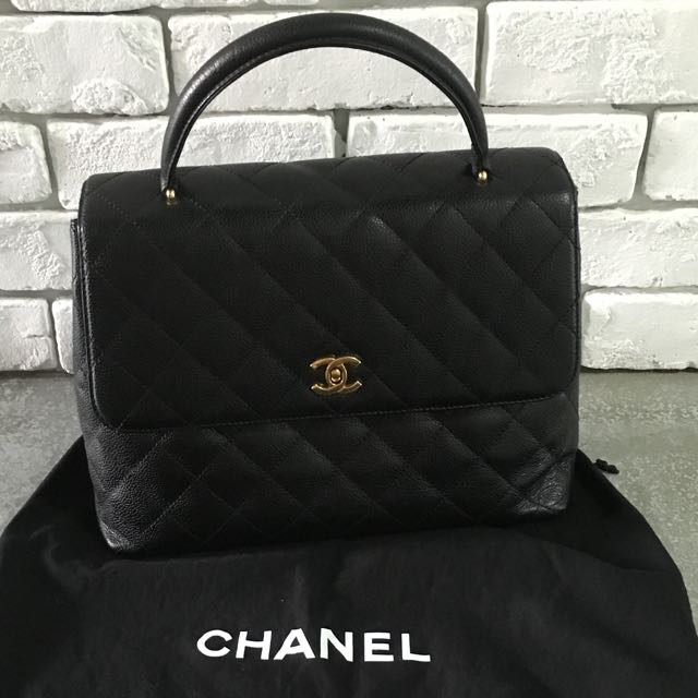 CHANEL VINTAGE TRAPEZE SHAPE BAG black suede quilted pattern with two top  handles black leather interior iconic interlocked CC lock gold tone  hardware and dust bag 28cm x 21cm H x 8cm