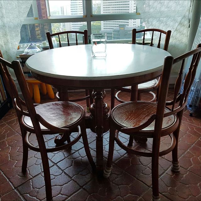 Second hand marble deals dining table and chairs