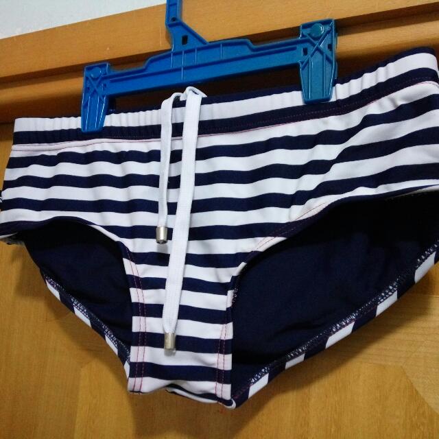 swimsuit brand with x logo