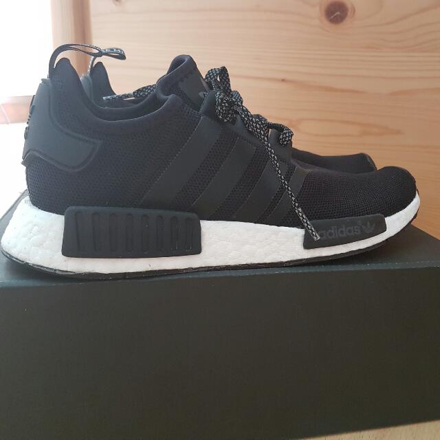 Nmd triple black reflective hot sale