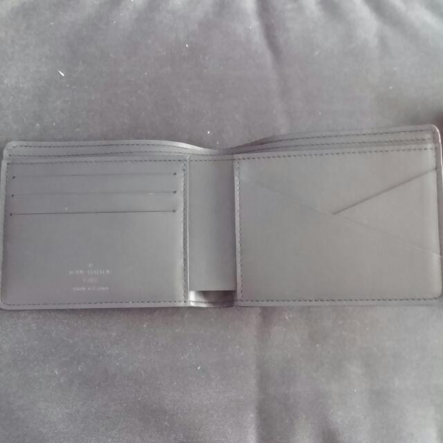 Louis Vuitton Men Multiple Wallet in embossed Damier Infini leather. For  Sale at 1stDibs