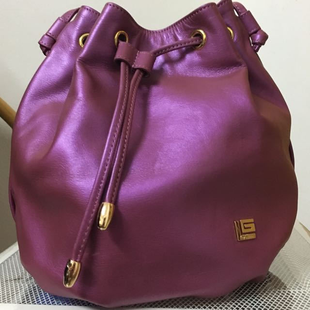 Guy Laroche Large Monogram Tote with Pouch, Women's Fashion, Bags &  Wallets, Purses & Pouches on Carousell
