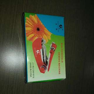 Brand-new Mini Handheld Sewing Machine
