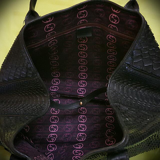 Gucci Black Python Shoulder Bag (Category: Bags & Wallets) located in Singapore. Submitted by potters (Listing ID 72667734, Image 2). Description: Authentic Overall good condition including inner lining Comes with dust bag Very spacious Approximate measurements: L: 46cm H: 27cm D: 12cm.