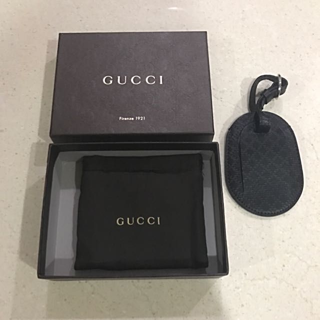 luggage tag gucci