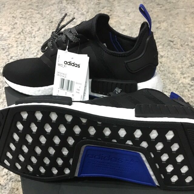 Nmd black shop blue tag