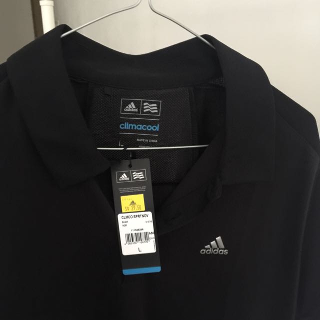 black adidas golf shirt
