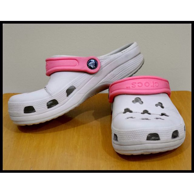 white and pink crocs