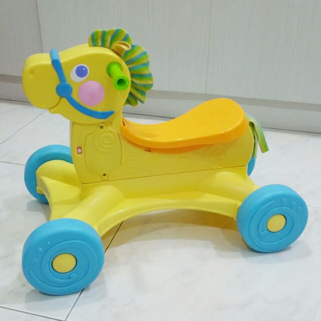 fisher price roll along musical pony