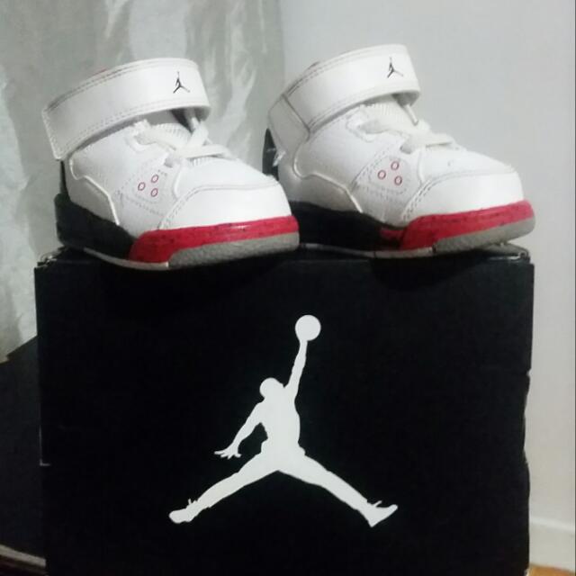 red and white baby jordans