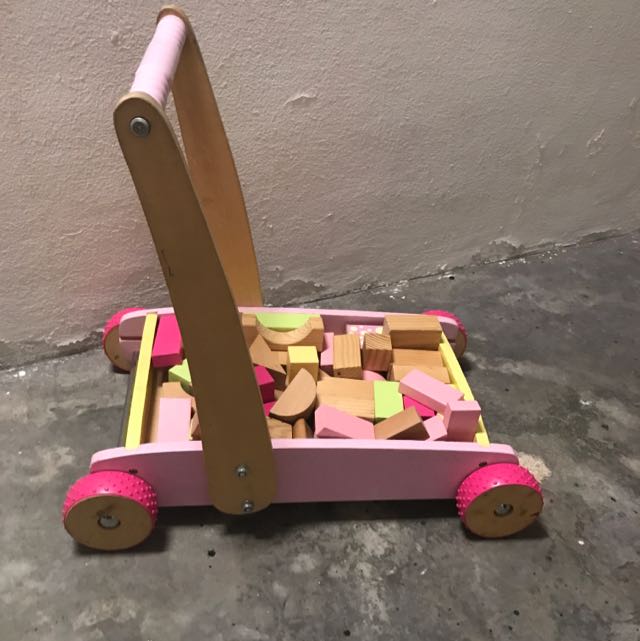 pink wooden walker