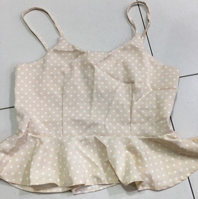 beige polka dot top