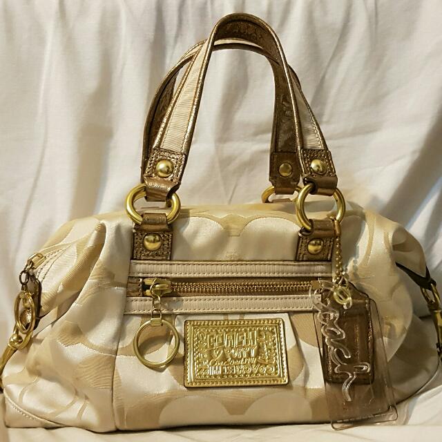 Gold coach poppy purse sale