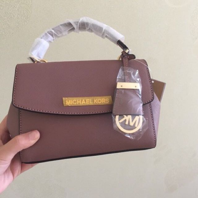 mk mini sling bag