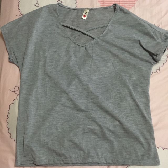 Criss-cross Basic Tee (Category: Sleeveless) located in Singapore. Submitted by white_daisyx (Listing ID 79474042, Image 1). Description: .