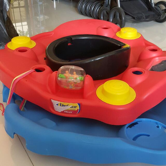 Evenflo exersaucer best sale delux
