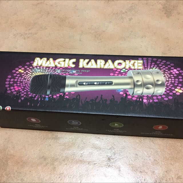 Microphone with shop speaker attached