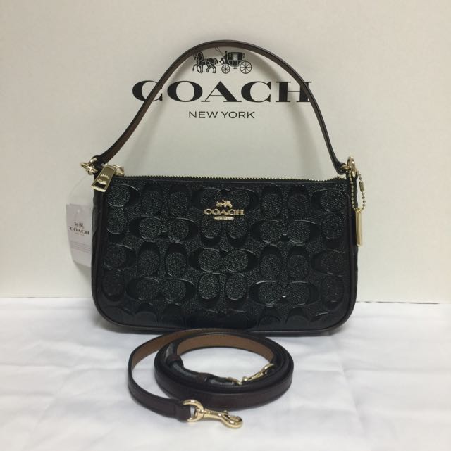 Coach top handle pouch in signature leather shop