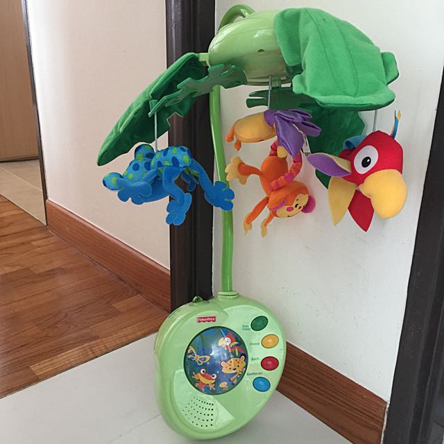 Fisher Price Rainforest Peek A Boo Cot Mobile, Babies & Kids on Carousell