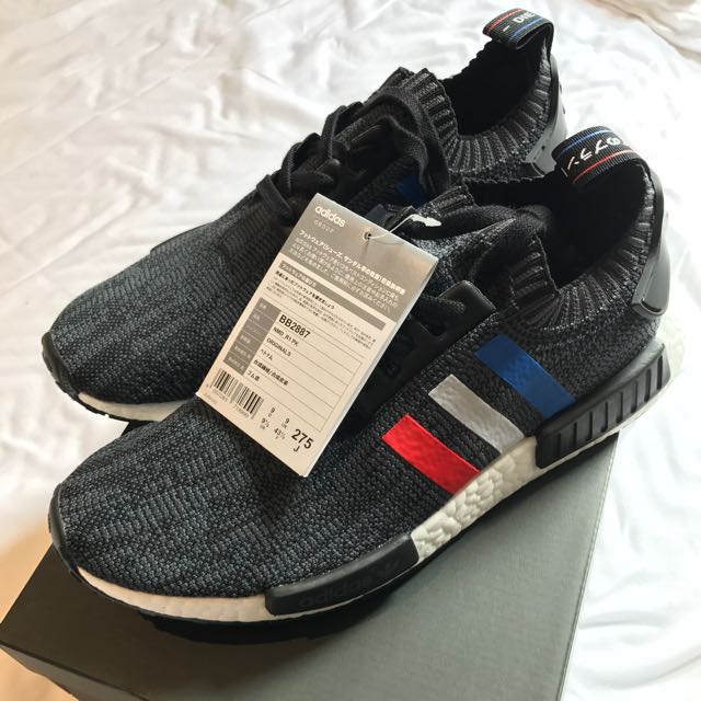Nmd best sale black trico
