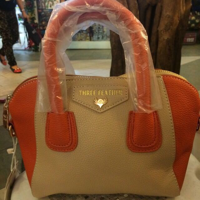 Three shop feather bag