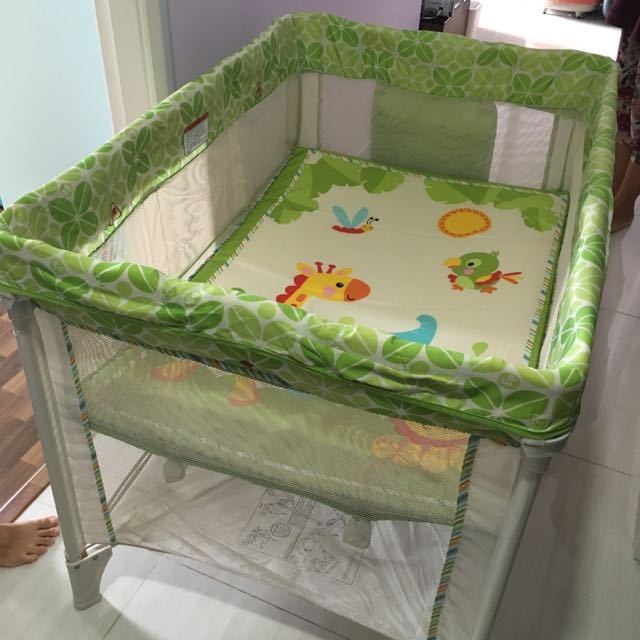 Fisher price cheap rainforest portacot