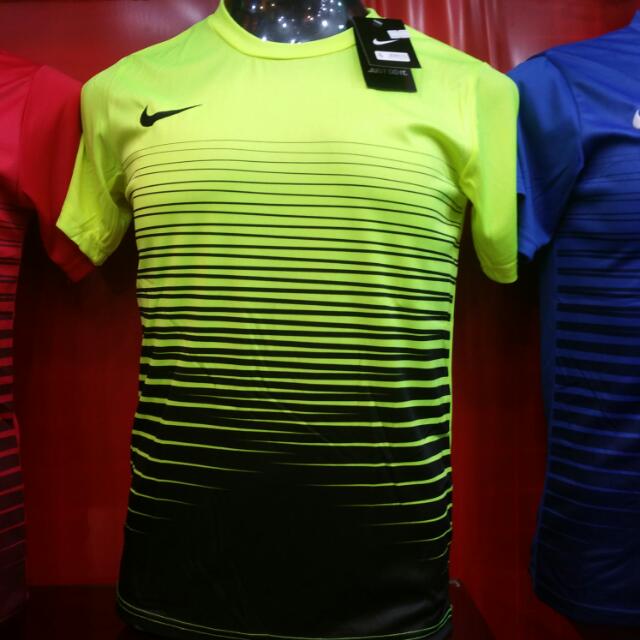 luminous green nike shirt