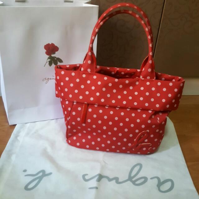 red polka dot luggage