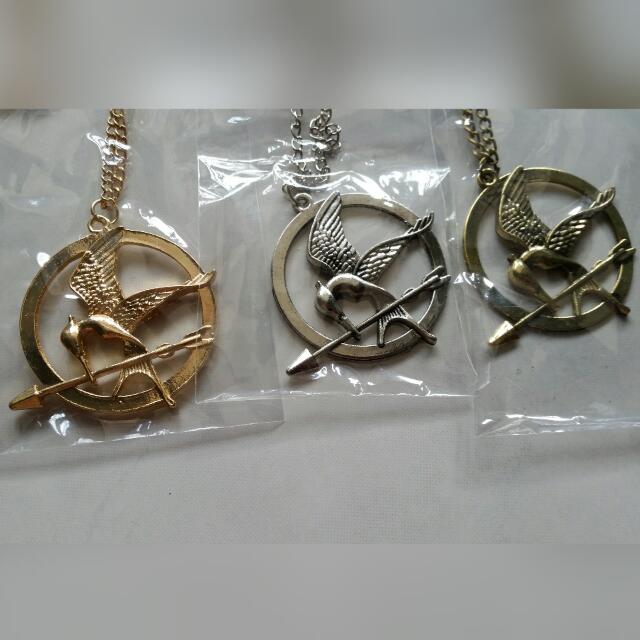 New HUNGER GAMES Necklace inspired mockingjay with arrow retro Bronze |  Shopee Singapore