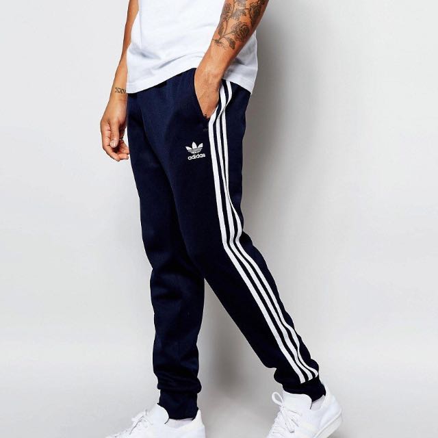 cuffed track pants by adidas originals