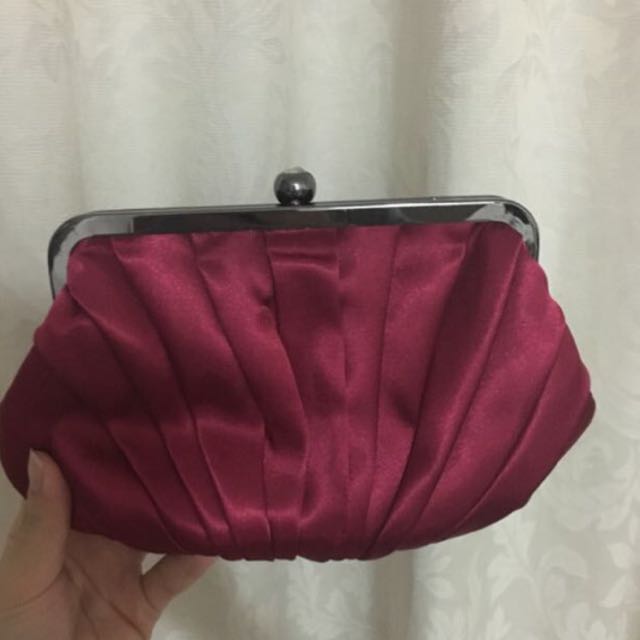 deep pink clutch bag