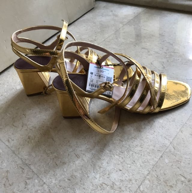 Premium AI Image | Luxury celestial golden heels in the style of Zara