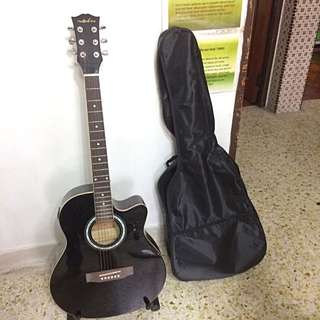 the olive tree black semi-acoustic guitar